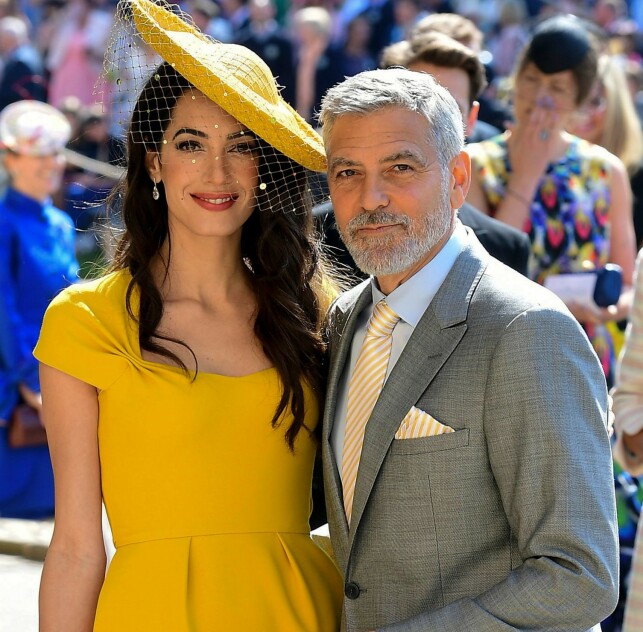 BRYLLUP: George og Amal Clooney i bryllupet til hertigunne Meghan og prins Harry i mai i fjor. Foto: NTB Scanpix BRYLLUP: George og Amal Clooney i bryllupet til hertigunne Meghan og prins Harry i mai i fjor. Foto: NTB Scanpix