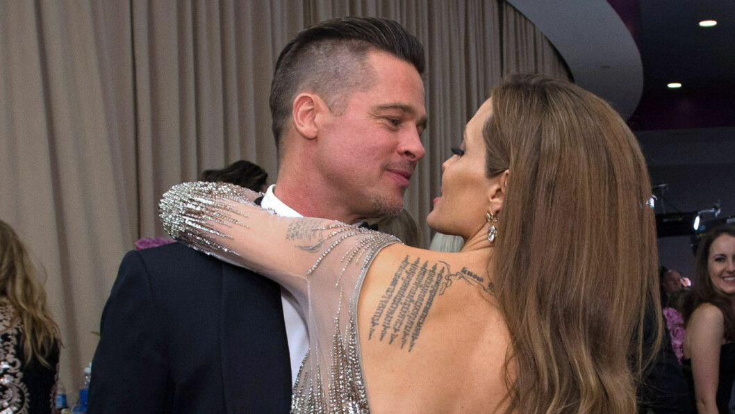 FORELSKET: Brad og Angelina la ikke skjul på sin forelskelse under årets Oscar-utdeling i Los Angeles. Foto: Stella Pictures FORELSKET: Brad og Angelina la ikke skjul på sin forelskelse under årets Oscar-utdeling i Los Angeles. Foto: Stella Pictures