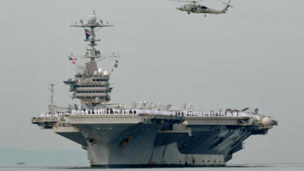 PÅ VEI: USS George Washington er på vei til området der det er hørt artilleri-ild i morgentimene norsk tid. Hangarskipet har med seg 80 jagerfly og 6000 soldater. Foto: AFP PÅ VEI: USS George Washington er på vei til området der det er hørt artilleri-ild i morgentimene norsk tid. Hangarskipet har med seg 80 jagerfly og 6000 soldater. Foto: AFP