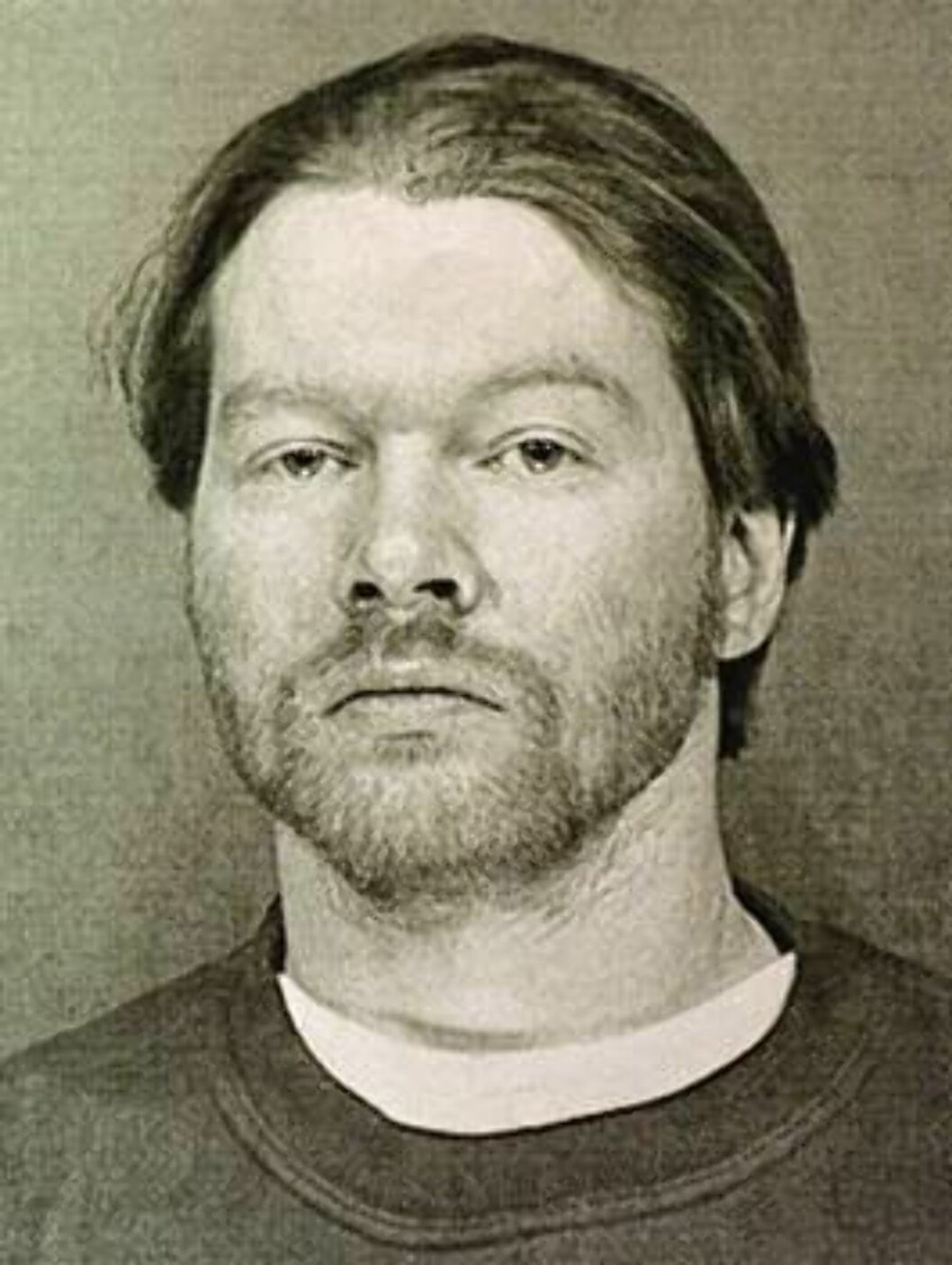 Axl Rose, lead singer for the band Guns N' Roses, shown here in a Maricopa Sheriffs booking photo after he was arrested Tuesday, Feb. 10, 1998 on a misdemeanor conduct charge for allegedly verbally abusing a security checkpoint employee at Sky Harbor Air Foto: AP Axl Rose, lead singer for the band Guns N' Roses, shown here in a Maricopa Sheriffs booking photo after he was arrested Tuesday, Feb. 10, 1998 on a misdemeanor conduct charge for allegedly verbally abusing a security checkpoint employee at Sky Harbor Air Foto: AP