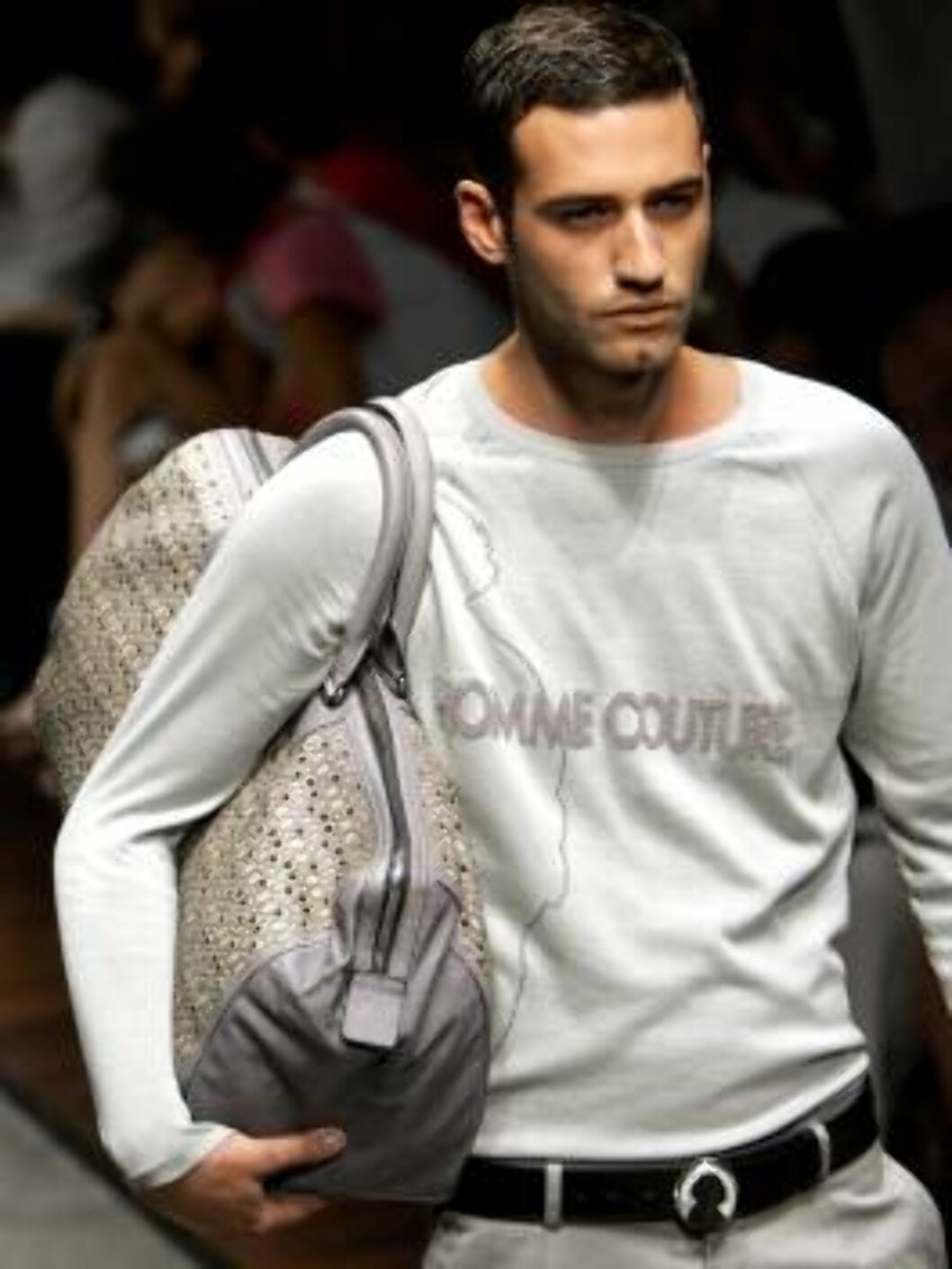A model wears a belt with a detail showing the silhouette of Italian designer Gianfranco Ferre`, part of the Gianfranco Ferre` Spring-Summer 2007 men's collection, unveiled in Milan, Italy, Monday, June 26, 2006. (AP Photo/Antonio Calanni) Foto: AP/Scanpix A model wears a belt with a detail showing the silhouette of Italian designer Gianfranco Ferre`, part of the Gianfranco Ferre` Spring-Summer 2007 men's collection, unveiled in Milan, Italy, Monday, June 26, 2006. (AP Photo/Antonio Calanni) Foto: AP/Scanpix