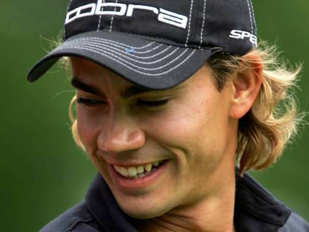 <strong>MAMARONECK, NY - JUNE 17:</strong> Camilo Villegas of Colombia smiles during the third round of the 2006 US Open Championship at Winged Foot Golf Club on June 17, 2006 in Mamaroneck, New York. (Photo by Jamie Squire/Getty Images) *** Local Caption *** Camilo Vil Foto: All Over Press <strong>MAMARONECK, NY - JUNE 17:</strong> Camilo Villegas of Colombia smiles during the third round of the 2006 US Open Championship at Winged Foot Golf Club on June 17, 2006 in Mamaroneck, New York. (Photo by Jamie Squire/Getty Images) *** Local Caption *** Camilo Vil Foto: All Over Press