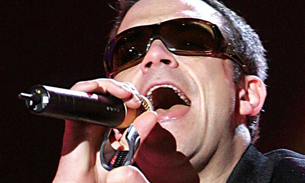 RIK OG ULYKKELIG: Robbie Williams tjener gode penger, men tror han ville vært mer lykkelig med en tynnere lommebok. FOTO: SCANPIX/REUTERS RIK OG ULYKKELIG: Robbie Williams tjener gode penger, men tror han ville vært mer lykkelig med en tynnere lommebok. FOTO: SCANPIX/REUTERS