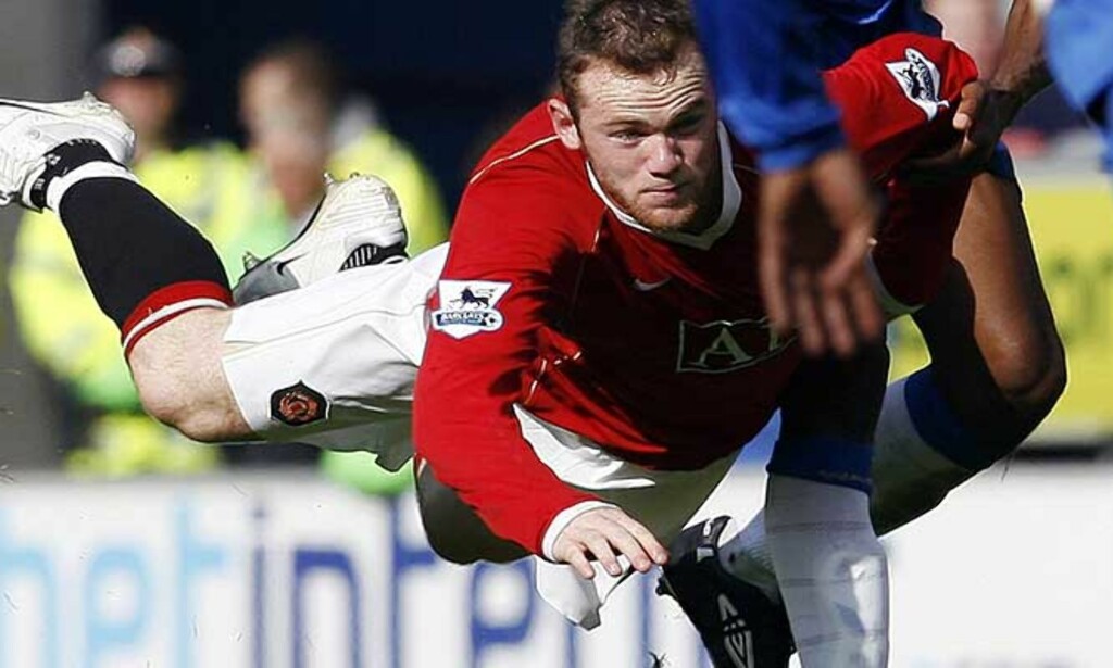 AVHØRES: Wayne Rooney må forklare seg for politiet etter at han er anklaget for å ha flydd på en fotograf. Hendelsen skal ha funnet sted utenfor en nattklubb i Manchester på morgenkvisten etter denne kampen mot Wigan. Foto: Reuters/Scanpix AVHØRES: Wayne Rooney må forklare seg for politiet etter at han er anklaget for å ha flydd på en fotograf. Hendelsen skal ha funnet sted utenfor en nattklubb i Manchester på morgenkvisten etter denne kampen mot Wigan. Foto: Reuters/Scanpix