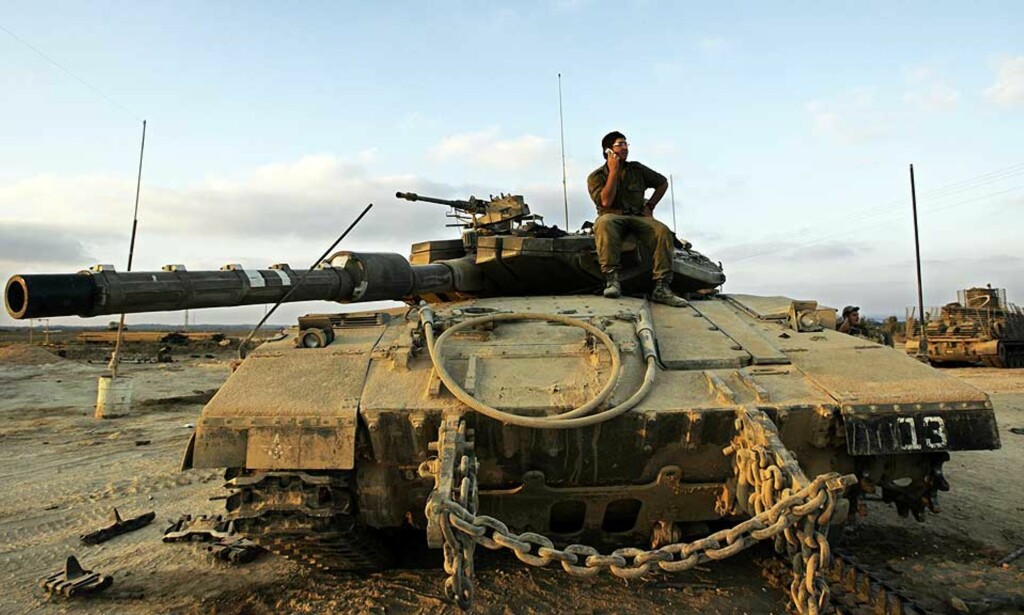 MOT FREDELIGERE DAGER?: En israelsk soldat stasjonert ved grensa til Gaza. Foto: TARA TODRAS-WHITEHILL/AP/SCANPIX MOT FREDELIGERE DAGER?: En israelsk soldat stasjonert ved grensa til Gaza. Foto: TARA TODRAS-WHITEHILL/AP/SCANPIX