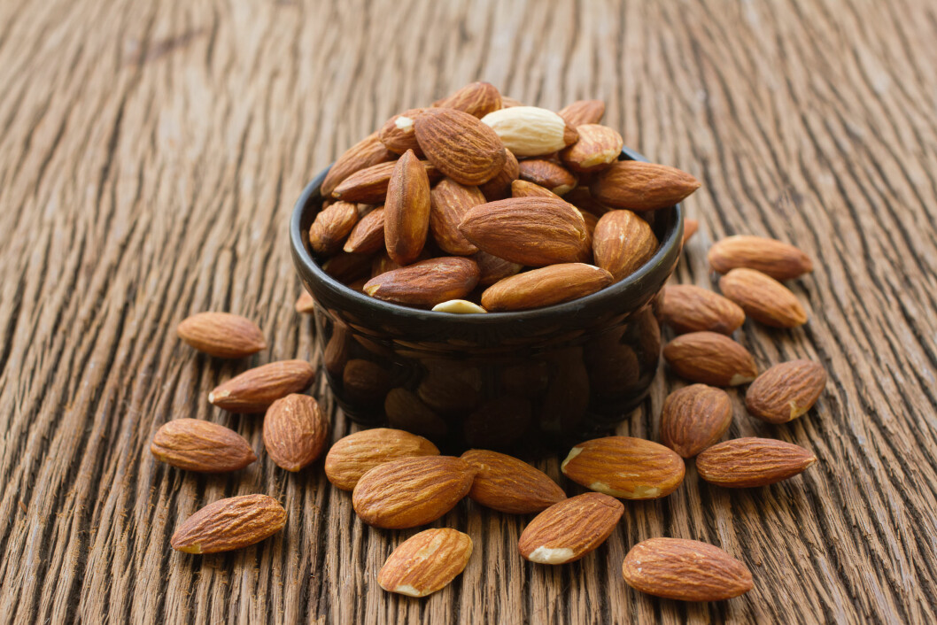 MANDLER: Mandler en god kilde til vitamin E. Vitaminet er en kraftig antioksidant som hjelper kroppen å bekjempe frie radikaler. Foto: praisaeng - Fotolia MANDLER: Mandler en god kilde til vitamin E. Vitaminet er en kraftig antioksidant som hjelper kroppen å bekjempe frie radikaler. Foto: praisaeng - Fotolia