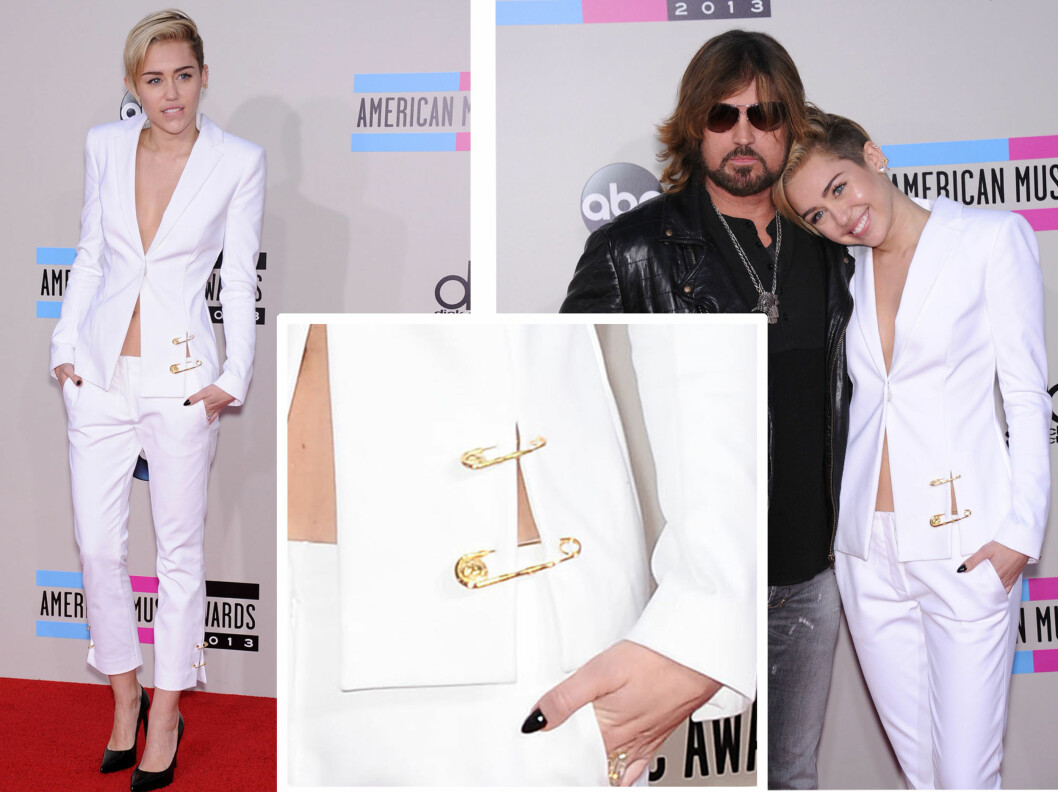 <strong>MED PAPPA:</strong> Popstjernen kom med sin far Billy Ray Cyrus. Legg merke til neglene og de kule sikkerhetsnål-detaljene på Versace-dressen. Foto: All Over Press <strong>MED PAPPA:</strong> Popstjernen kom med sin far Billy Ray Cyrus. Legg merke til neglene og de kule sikkerhetsnål-detaljene på Versace-dressen. Foto: All Over Press
