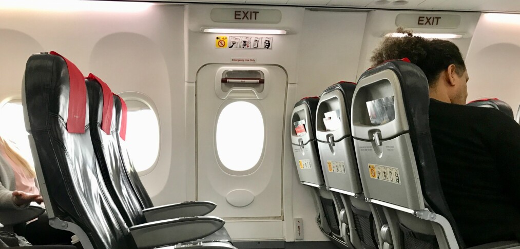 Passasjer prøvde å åpne flydør Passasjer prøvde å åpne flydør