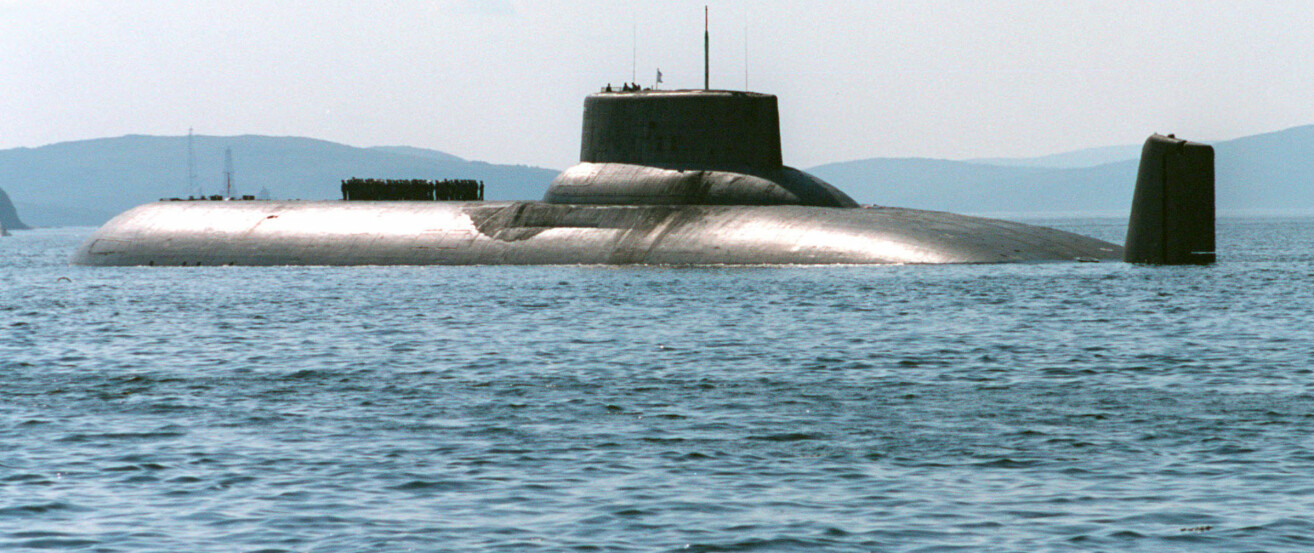 ** FILE ** Arkhangelsk, one of Russia's largest Typhoon-type Soviet-built nuclear submarines, heaves ahead in the Barents Sea near Severomorsk, Russia in this July 27, 2003 file picture. President Vladimir Putin on Tuesday went out to the Barents Sea on board Arkhangelsk to observe a massive military exercise set to involve numerous missile launches and flights of strategic bombers. (AP Photo/ file) ** FILE ** Arkhangelsk, one of Russia's largest Typhoon-type Soviet-built nuclear submarines, heaves ahead in the Barents Sea near Severomorsk, Russia in this July 27, 2003 file picture. President Vladimir Putin on Tuesday went out to the Barents Sea on board Arkhangelsk to observe a massive military exercise set to involve numerous missile launches and flights of strategic bombers. (AP Photo/ file)