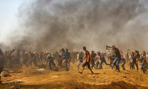image: Rett etter at Mohammed tok dette bildet, ble han skutt i beinet