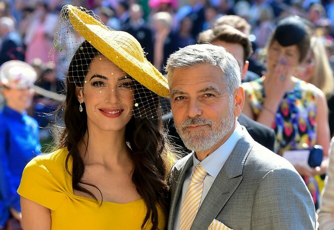 BRYLLUP: George og Amal Clooney i bryllupet til hertigunne Meghan og prins Harry i mai i fjor. Foto: NTB Scanpix BRYLLUP: George og Amal Clooney i bryllupet til hertigunne Meghan og prins Harry i mai i fjor. Foto: NTB Scanpix