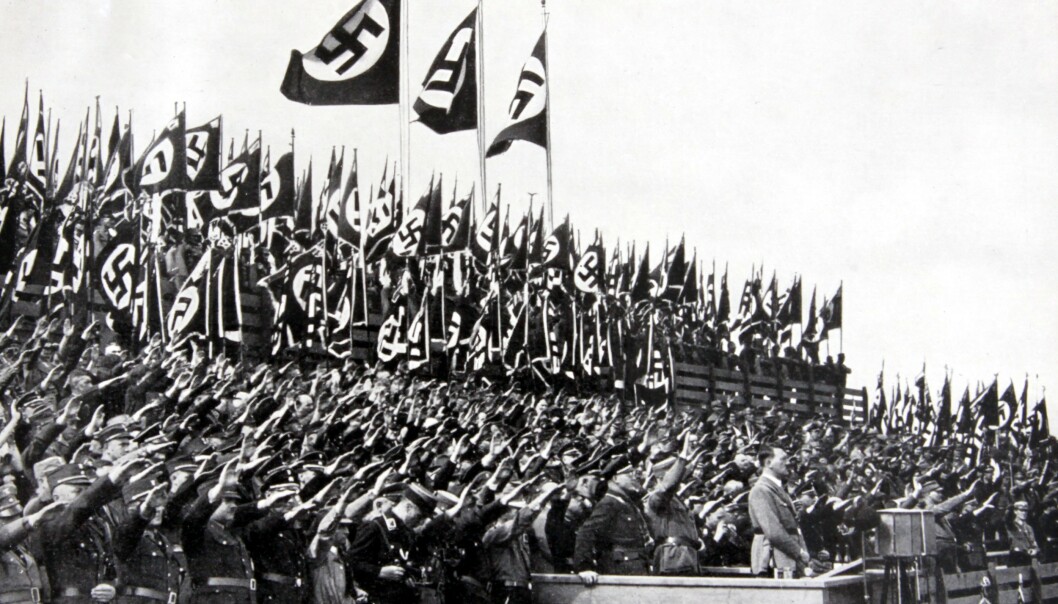 <strong>NASJONALFLAGG:</strong> Svastikaen var del av Tysklands nasjonalflagg i perioden 1933-45. Her fra NSDAPs partikongress i Nürnberg i 1935, der de antisemittiske Nürnberg-lovene ble vedtatt. Foto: Rex Shutterstock / NTB Scanpix <strong>NASJONALFLAGG:</strong> Svastikaen var del av Tysklands nasjonalflagg i perioden 1933-45. Her fra NSDAPs partikongress i Nürnberg i 1935, der de antisemittiske Nürnberg-lovene ble vedtatt. Foto: Rex Shutterstock / NTB Scanpix