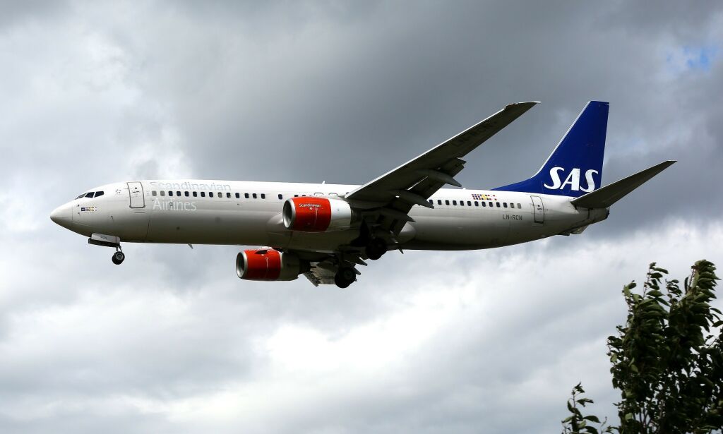 Mandatory Credit: Photo by Dinendra Haria/REX (8979815ag)
SAS approaches for landing at Heathrow Airport.
Aircraft approaching Heathrow Airport, London, UK - 31 Jul 2017