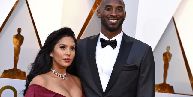 FILE - In this March 4, 2018, file photo, Kobe Bryant, right, and his wife Vanessa Bryant arrive at the Oscars at the Dolby Theatre in Los Angeles. Kobe Bryant's widow Vanessa Bryant has sued the owner of the helicopter that crashed in fog and killed her husband and her 13-year-old daughter last month. The wrongful death lawsuit filed by Vanessa Bryant in Los Angeles says the pilot was careless and negligent by flying in cloudy conditions and should have aborted the flight. The pilot was among the nine people killed in the crash. The lawsuit was filed as a public memorial service for Kobe Bryant and his daughter was being held at the arena where Bryant played most of his career.(Photo by Jordan Strauss/Invision/AP, File)
