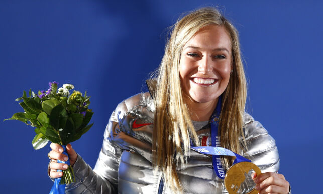Gold medalist Jamie Anderson of the U.S. poses on the podium at the medal ceremony after the women's snowboard slopestyle event at the
at the Sochi 2014 Sochi Winter Olympics, February 9, 2014. REUTERS/Shamil Zhumatov (RUSSIA - Tags: OLYMPICS SPORT SNOWBOARDING)