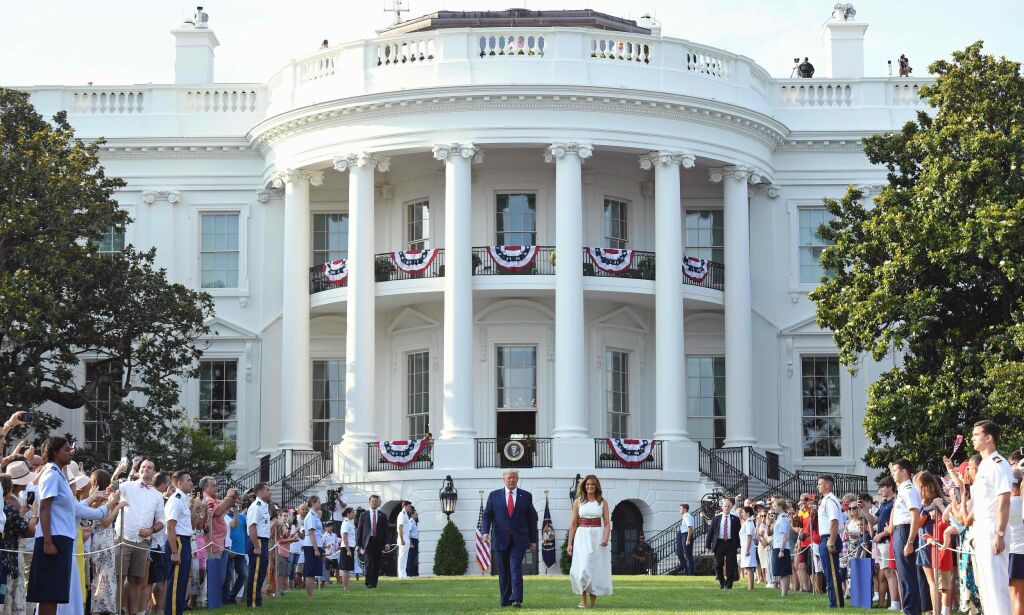 US President Donald Trump and First Lady Melania Trump arrive for the 2020 "Salute to America" event in honor of Independence Day on the South Lawn of the White House in Washington, DC, July 4, 2020. (Photo by SAUL LOEB / AFP)