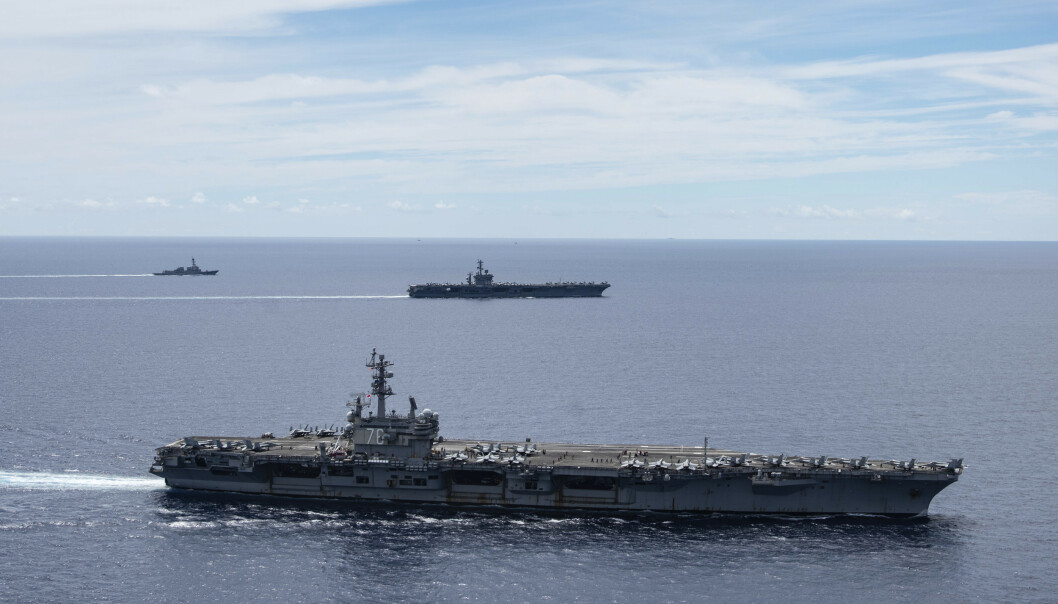 VISTE MUSKLER: Amerikanske hangaskip avbildet i Sør-Kinahavet mandag 6. juli. Den militære tilstedeværelsen kom som et svar på Kinas varslede militærøvelse i havområdet. Foto: Jason Tarleton / U.S. Navy / AP / NTB scanpix VISTE MUSKLER: Amerikanske hangaskip avbildet i Sør-Kinahavet mandag 6. juli. Den militære tilstedeværelsen kom som et svar på Kinas varslede militærøvelse i havområdet. Foto: Jason Tarleton / U.S. Navy / AP / NTB scanpix