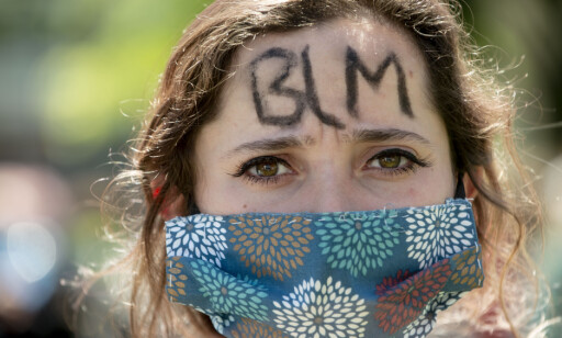 HETT TEMA: Kvinnelig demonstrant i Lansing, Michigan. Byen ligger en halvtimes kjøretur fra Saint John. Foto: NTB Scanpix. HETT TEMA: Kvinnelig demonstrant i Lansing, Michigan. Byen ligger en halvtimes kjøretur fra Saint John. Foto: NTB Scanpix.